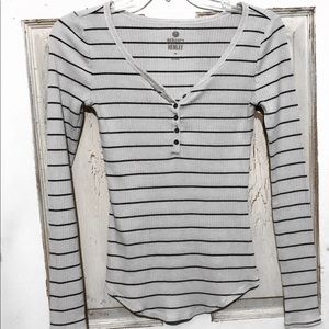 White long sleeve with brown horizontal lines.